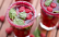 Glas mit Zuckerrand und pinkem Smoothie als Erfrischungsdrink
