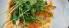 Vegetarisches Rezept: Kürbis-Flammkuchen mit Rucola-Haube