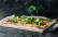 Vegetarisches Rezept: Kürbis-Flammkuchen mit Rucola-Haube 2